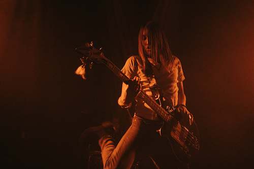 leisure activities woman playing guitar photography musical instrument